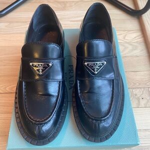 Prada black loafers triangle logo lug sole 40